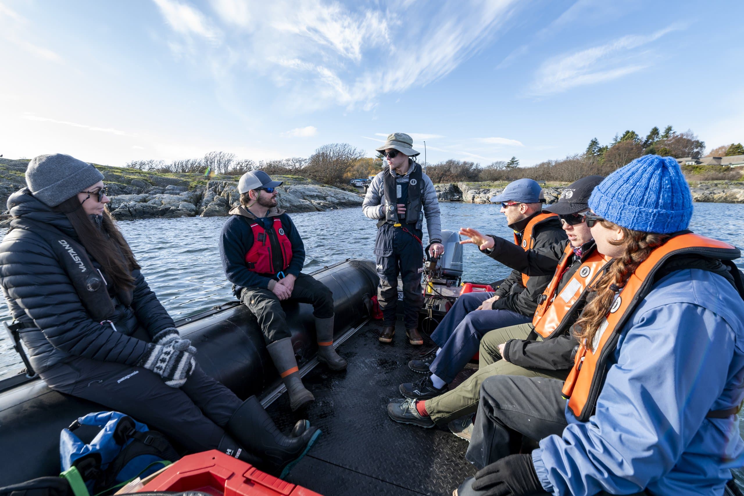 Instructor briefing students aboard the Zodiac